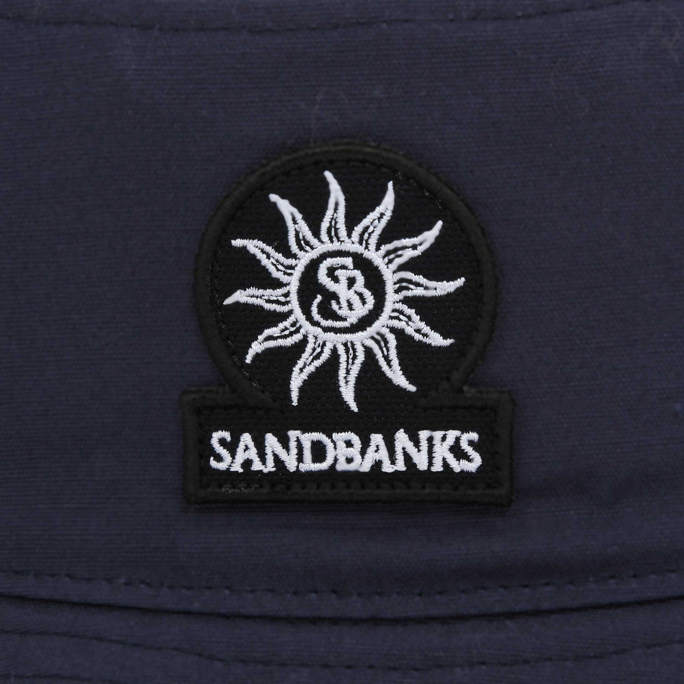 Sandbanks Badge Logo Bucket Hat in Navy Logo