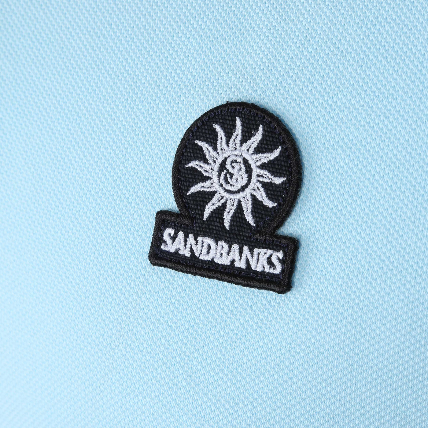 Sandbanks Badge Logo Polo Shirt in Crystal Blue Logo